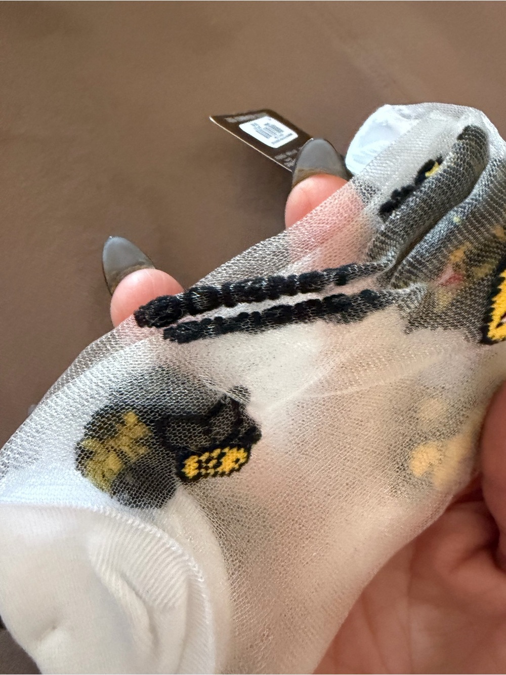 Disney White Sheer Socks with Yellow & Black Winnie the Pooh Accents - Picture 8 of 9